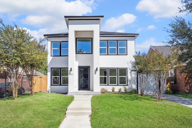 contemporary house with a front lawn