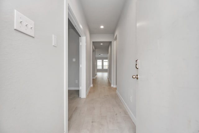 hallway featuring light hardwood / wood-style flooring