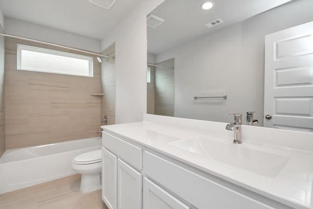 full bathroom with recessed lighting, vanity, toilet, visible vents, and tub / shower combination