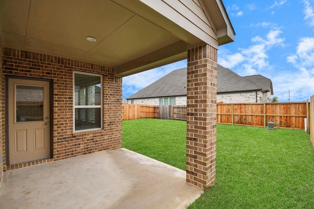 view of patio with a fenced backyard