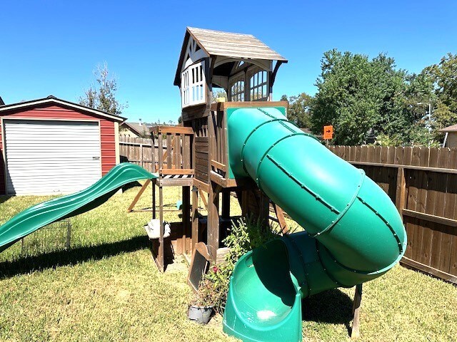 view of play area with a yard