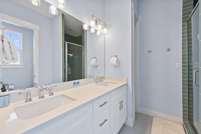 bathroom featuring vanity, tile patterned floors, and a shower with door