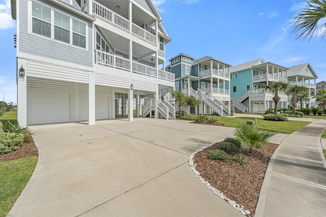 exterior space with a balcony and a garage