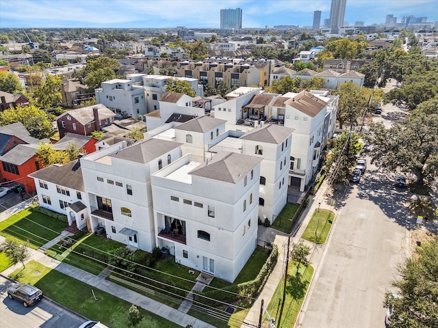 birds eye view of property with a view of city