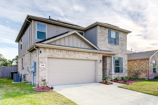 view of front of property featuring cooling unit, a front lawn, and a garage