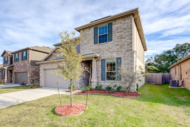 view of front of property featuring a front lawn, central AC unit, and a garage