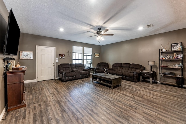 12 Dove St, New Waverly, TX 77358 - living area featuring ceiling fan, wood finished floors, a textured ceiling, baseboards, and recessed lighting