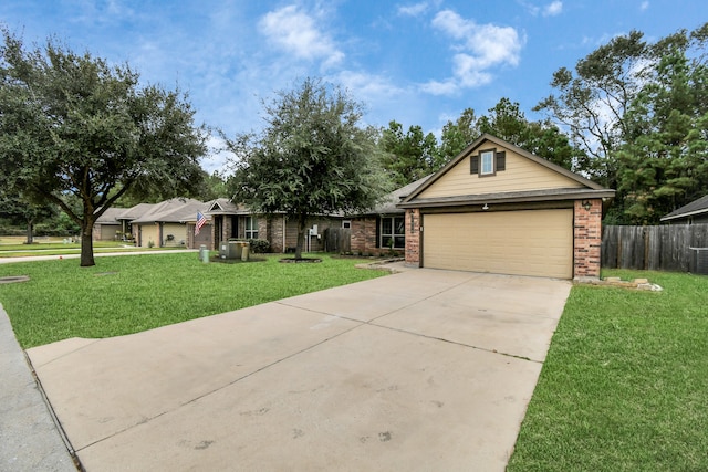 ranch-style home with a garage and a front lawn