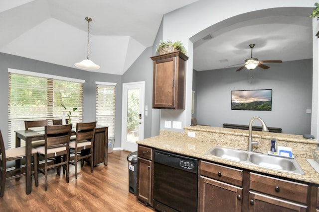 kitchen featuring lofted ceiling, hanging light fixtures, dishwasher, dark hardwood / wood-style floors, and sink