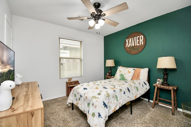 carpeted bedroom with ceiling fan