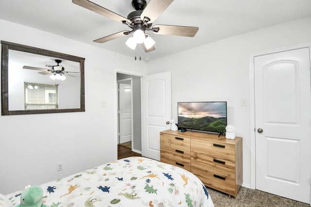 carpeted bedroom featuring ceiling fan