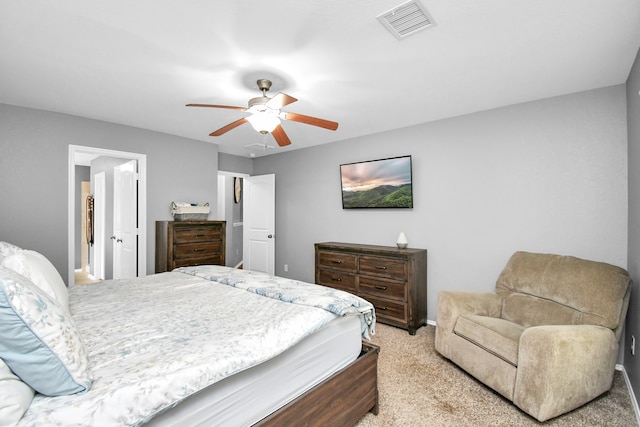 bedroom with light colored carpet and ceiling fan