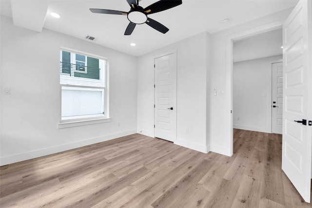 unfurnished bedroom featuring recessed lighting, baseboards, visible vents, and light wood-style flooring