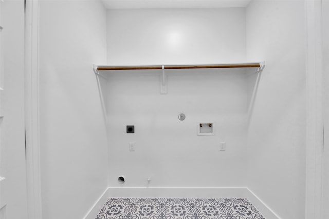 laundry room featuring gas dryer hookup, laundry area, electric dryer hookup, baseboards, and hookup for a washing machine