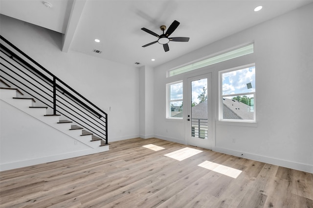 foyer entrance featuring recessed lighting, baseboards, wood finished floors, visible vents, and stairway