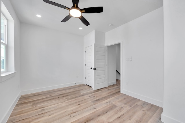 unfurnished bedroom featuring recessed lighting, baseboards, ceiling fan, and light wood finished floors