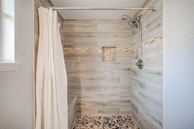 bathroom with a shower with curtain