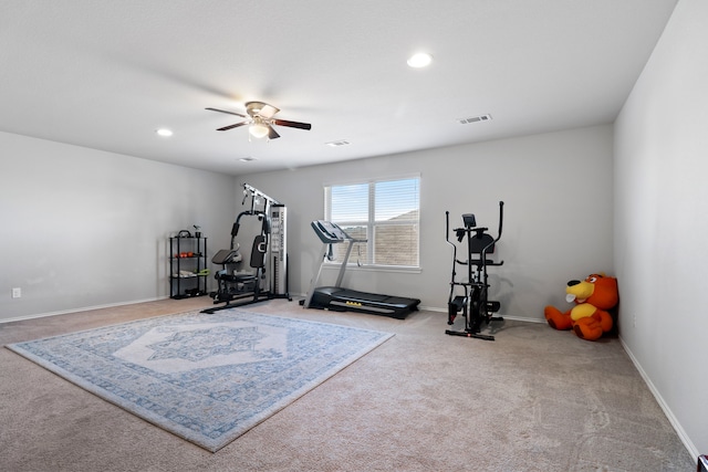 workout area with carpet flooring and ceiling fan