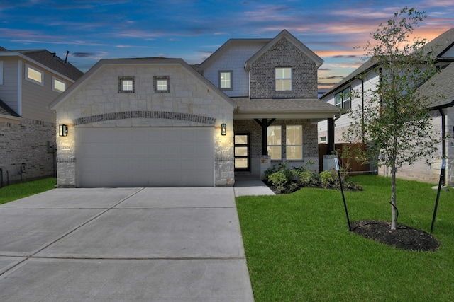 french country inspired facade with a yard, covered porch, and a garage