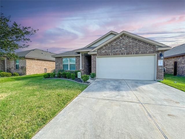 single story home with a yard and a garage