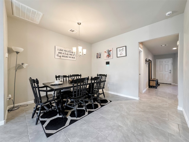 dining room featuring a notable chandelier