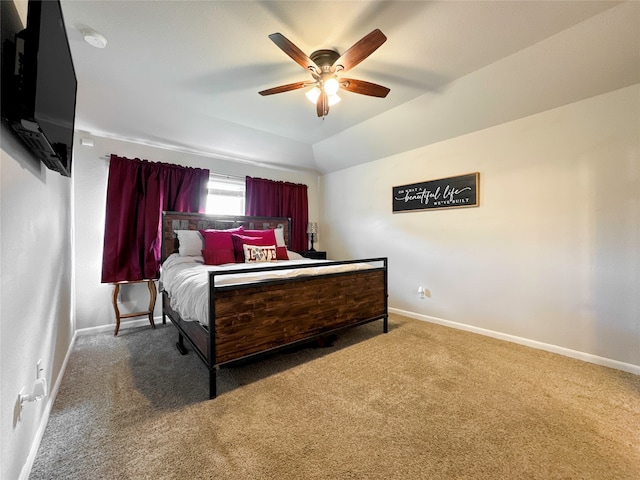 bedroom with lofted ceiling, carpet, and ceiling fan