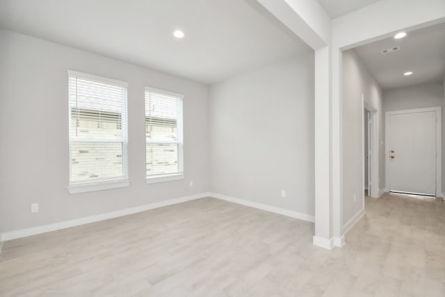 empty room featuring light hardwood / wood-style floors