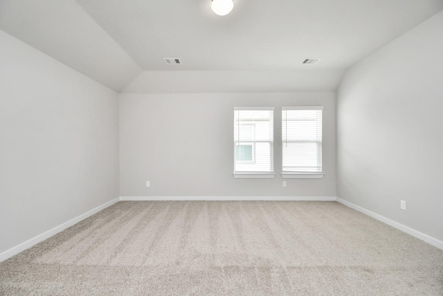 15714 Walnut Leaf Ln, Cypress, TX 77429 - empty room with carpet flooring and vaulted ceiling