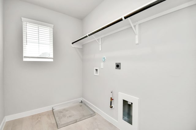 clothes washing area with gas dryer hookup, washer hookup, electric dryer hookup, and light wood-type flooring