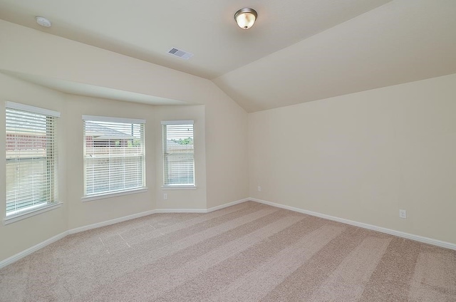 bonus room featuring carpet and lofted ceiling