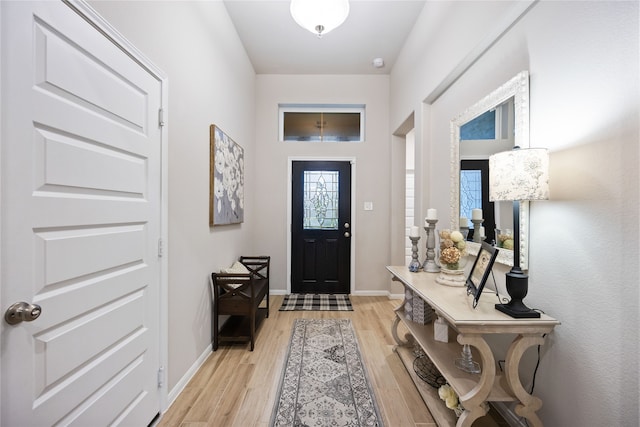 entryway with light hardwood / wood-style flooring