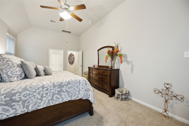 bedroom with ceiling fan, vaulted ceiling, and light colored carpet