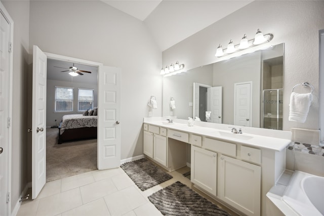 bathroom with shower with separate bathtub, ceiling fan, tile patterned floors, lofted ceiling, and vanity