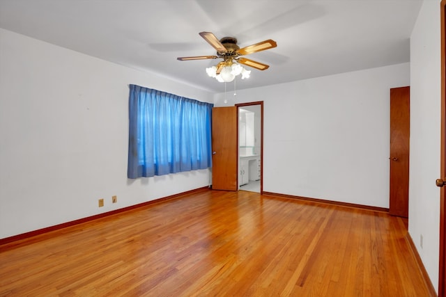 unfurnished room featuring light wood-type flooring and ceiling fan