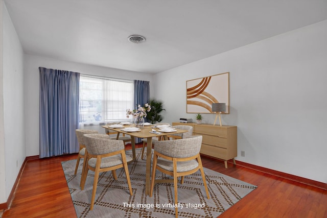 dining room featuring hardwood / wood-style floors