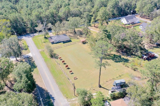 birds eye view of property featuring a rural view