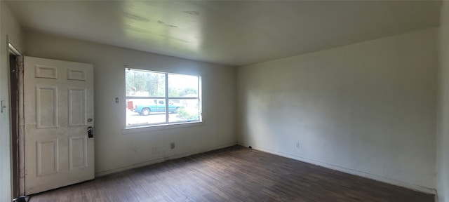 foyer with dark hardwood / wood-style flooring