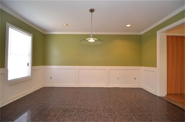 spare room with crown molding