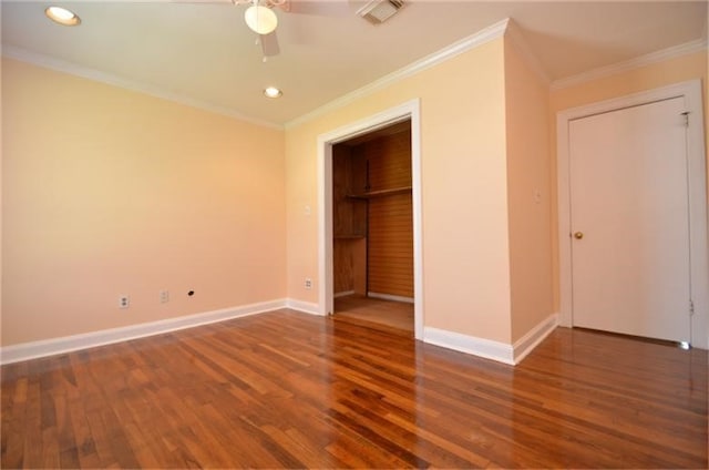 unfurnished bedroom with crown molding, dark hardwood / wood-style flooring, and ceiling fan