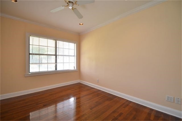 empty room with ceiling fan, ornamental molding, and dark hardwood / wood-style flooring