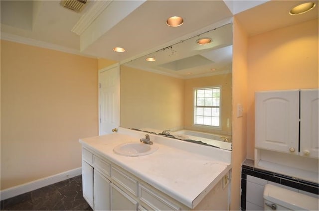 bathroom featuring toilet, ornamental molding, and vanity