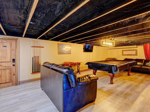 game room featuring hardwood / wood-style flooring and billiards