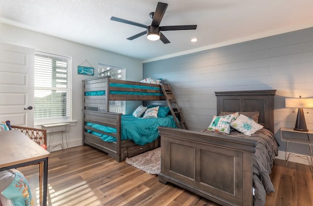 bedroom featuring dark hardwood / wood-style floors and ceiling fan