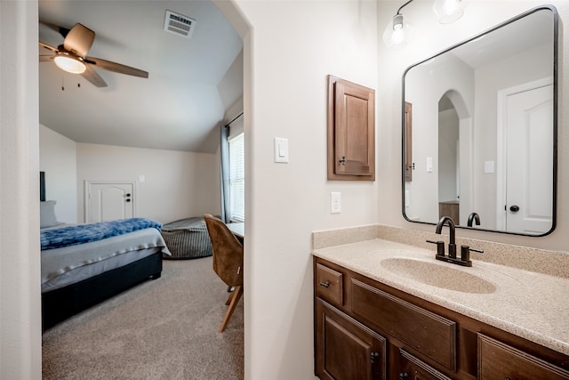 bathroom featuring vanity and ceiling fan