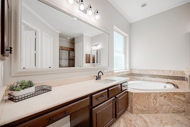 bathroom featuring vanity, ornamental molding, and independent shower and bath