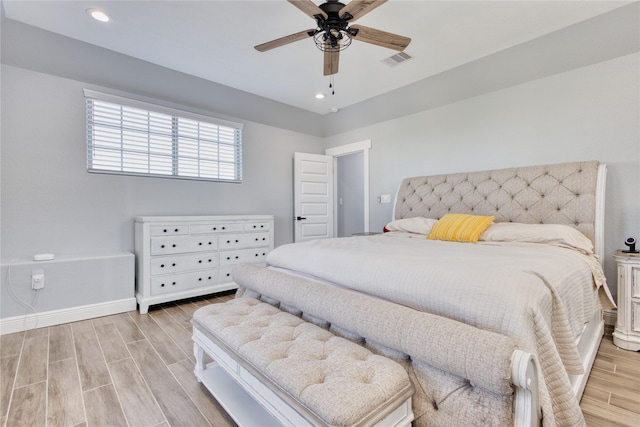 bedroom featuring visible vents, baseboards, ceiling fan, recessed lighting, and light wood-type flooring