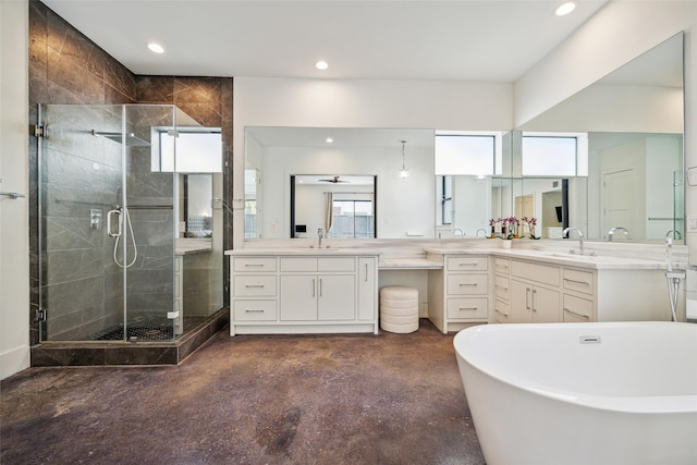 bathroom featuring vanity, plus walk in shower, and concrete flooring