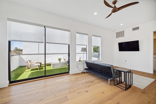 bedroom featuring light hardwood / wood-style flooring and ceiling fan