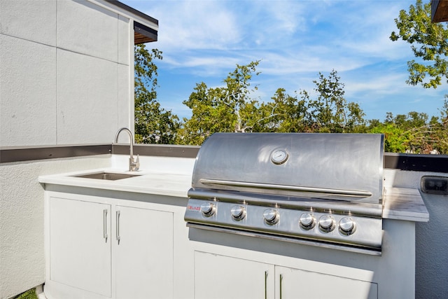 view of patio / terrace with sink and grilling area