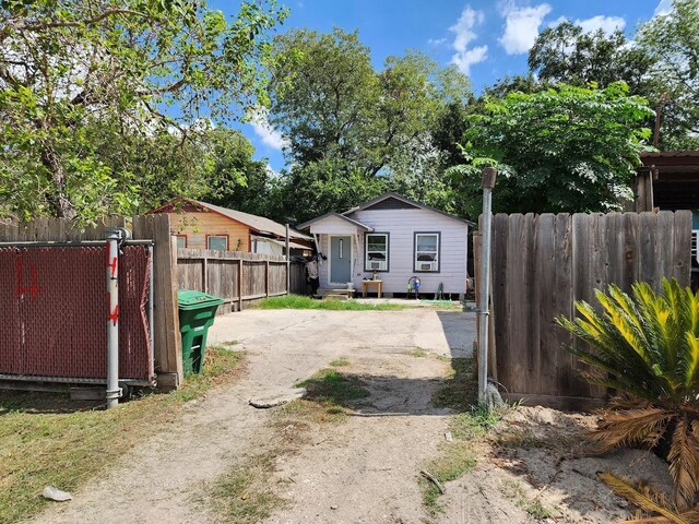 view of yard with an outbuilding and fence